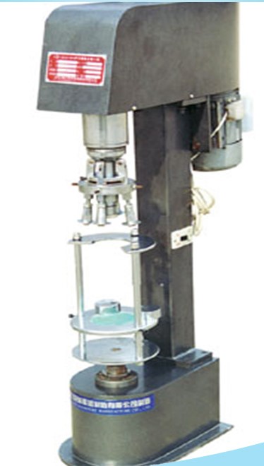 CAP SEALING MACHINE